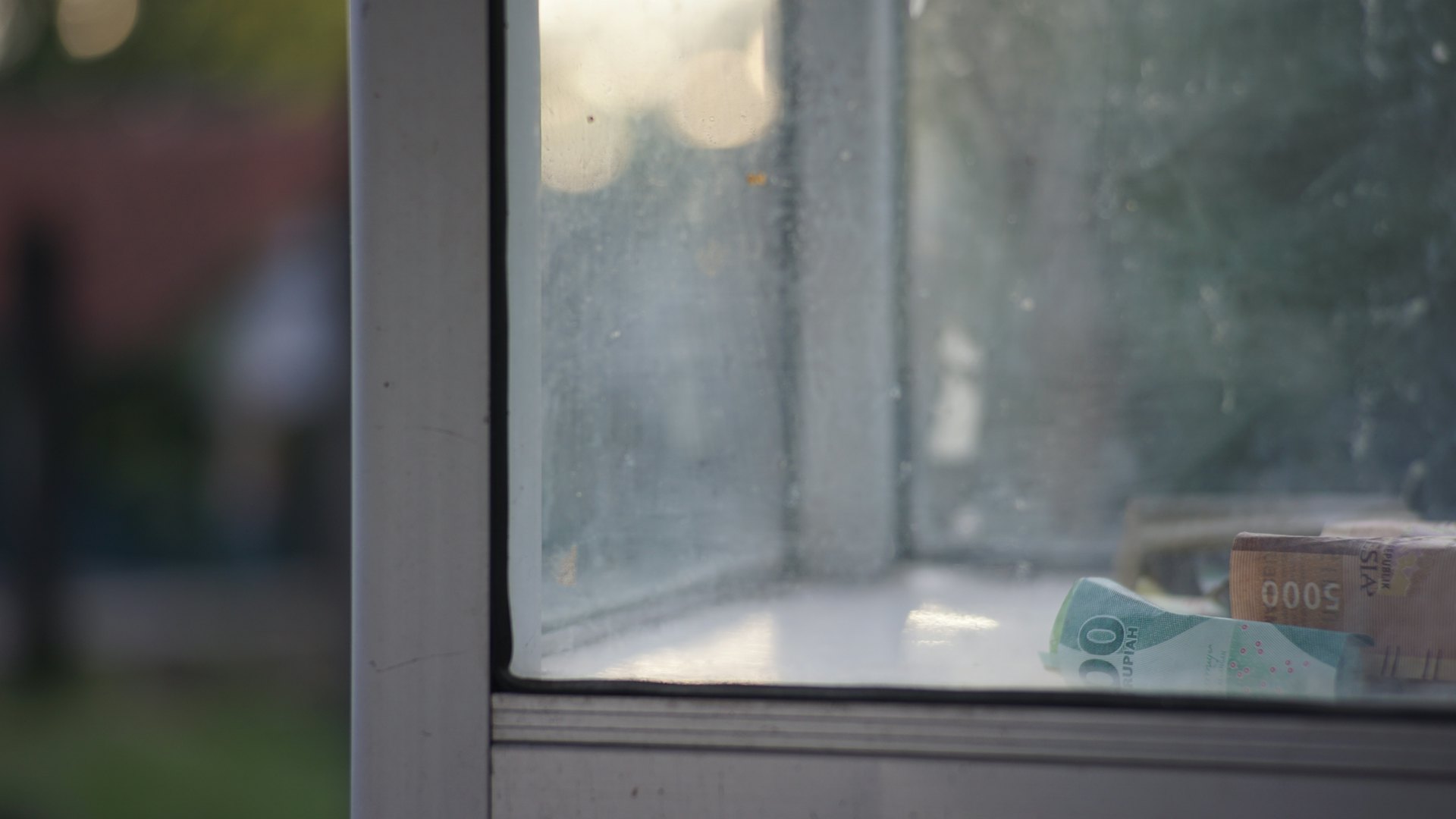 Condensation and frost on a house window in winter